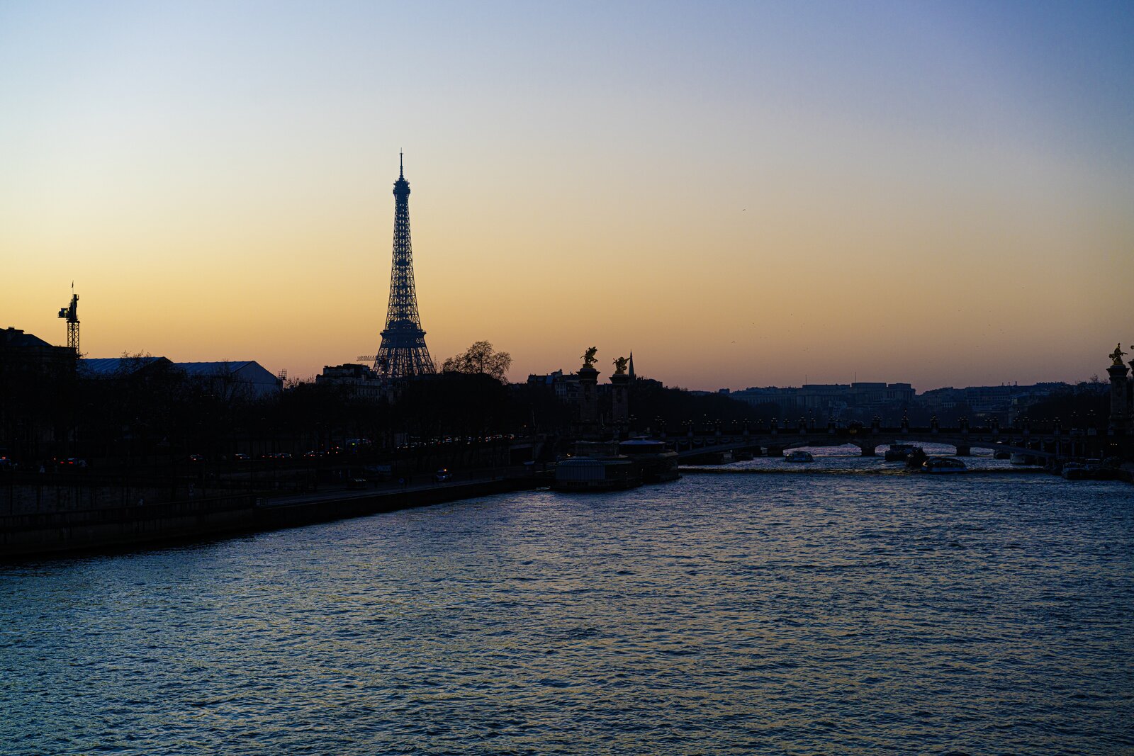 Eiffel Tower and the Seine at sunset