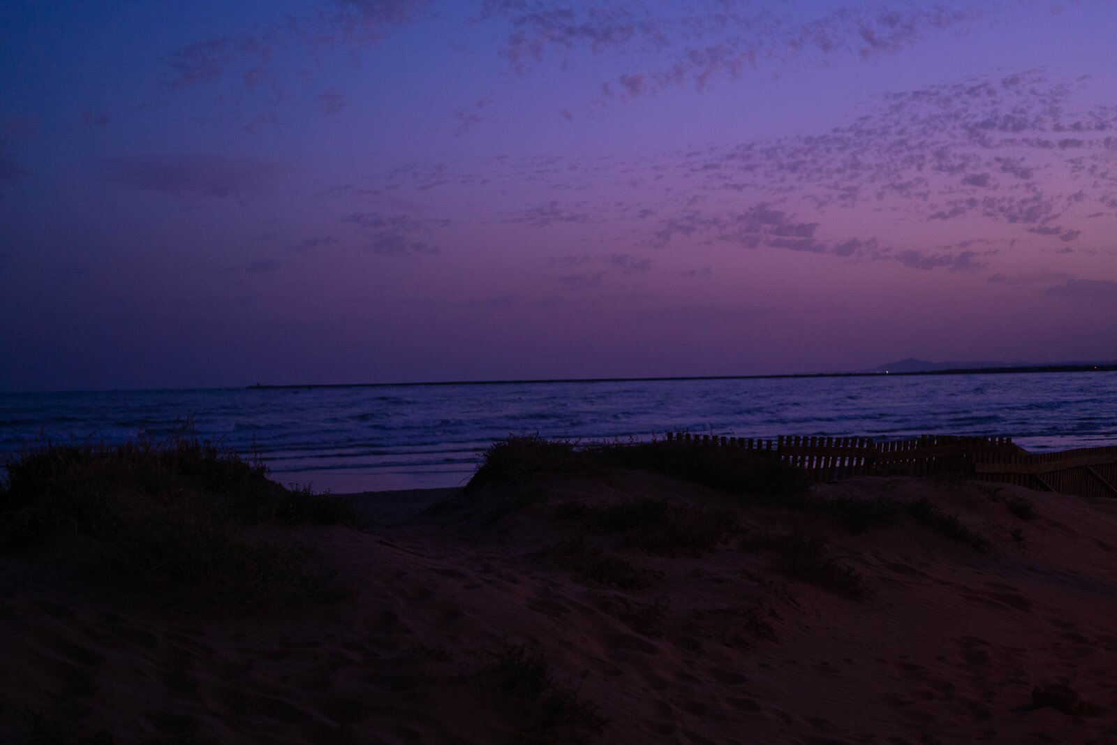 A dune at Isla Canela at sunset