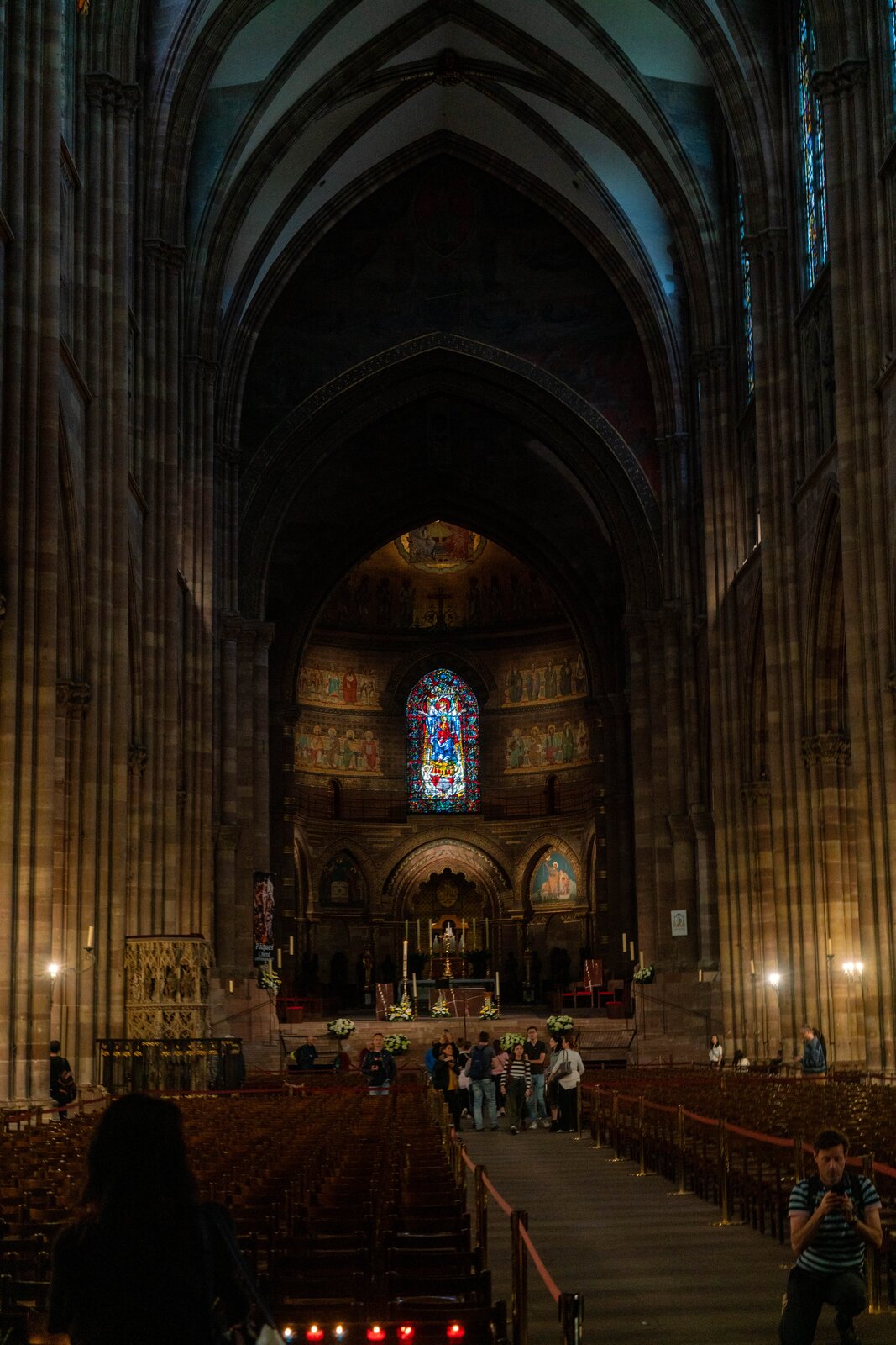 Cathedral nave, evening with stained glass